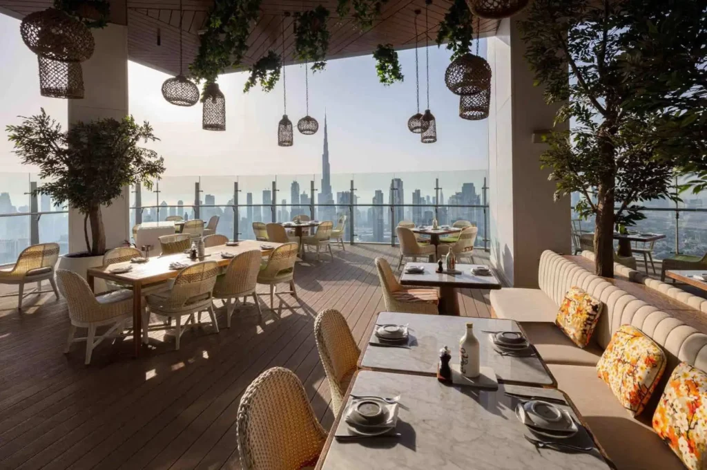 Fi'lia Dubai’s terrace dining featuring Dubai's urban panorama